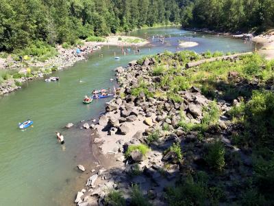 People swimming in the Sandy River at Glenn Otto Park
